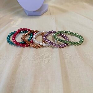 6 BRACELETS, FAUX PEARL, ELASTIC, TEAL, RED, GOLD, WHITE, GREEN, PURPLE, TAG ON,